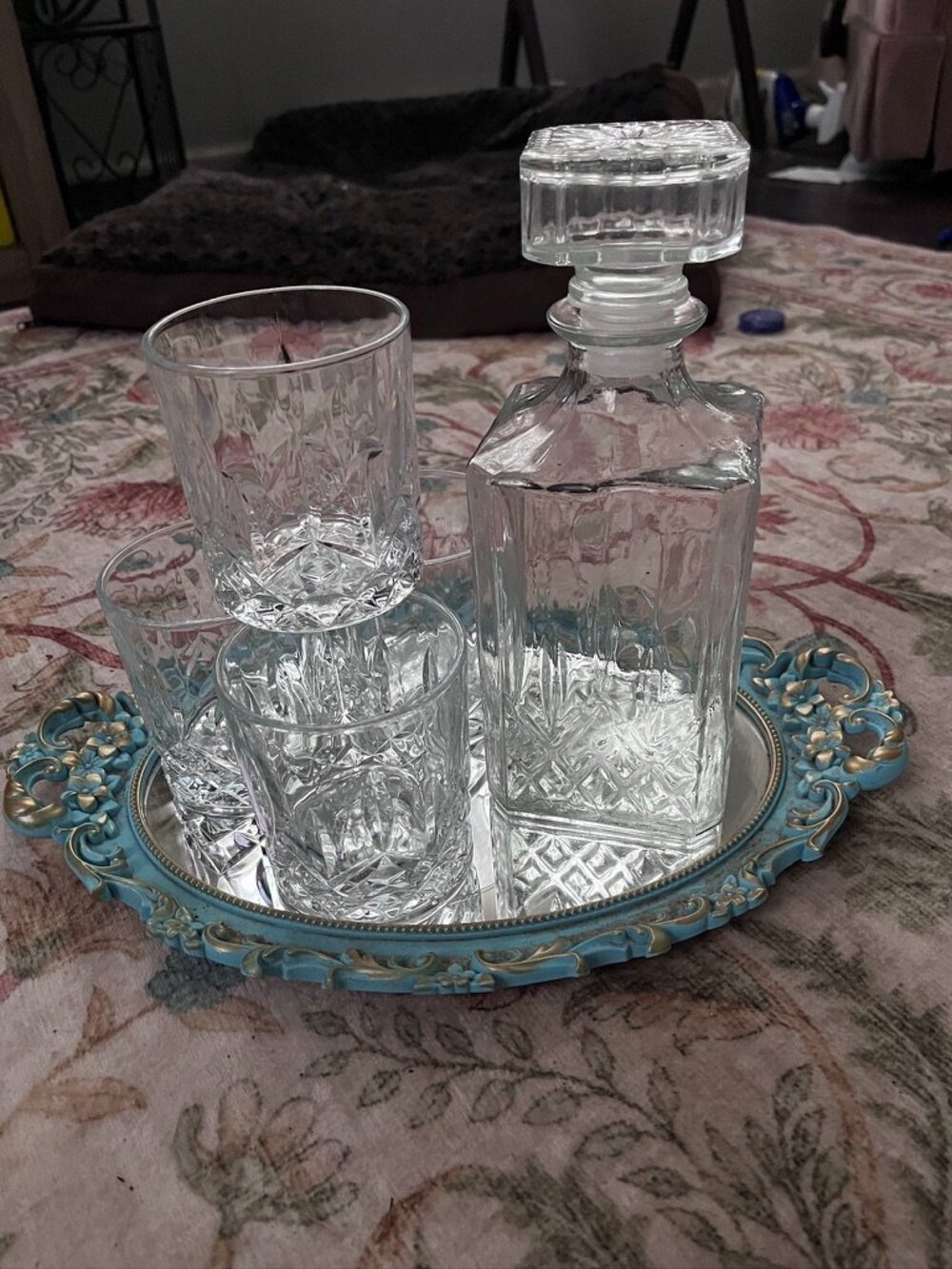 Cut glass decanter with matching tumblers
